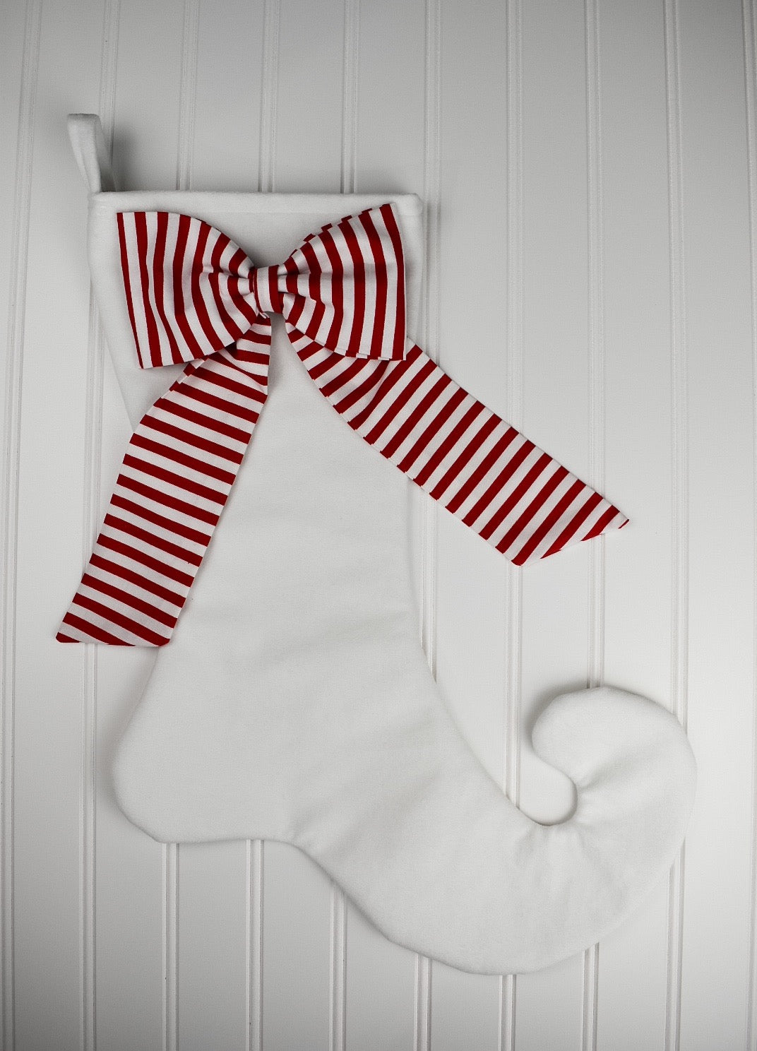 White Velvet Christmas Stocking with Candy Cane Bow